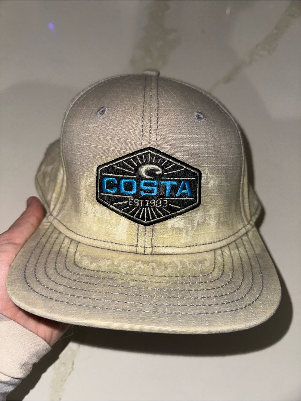 Costa Beige Hat with Blue Logo Patch